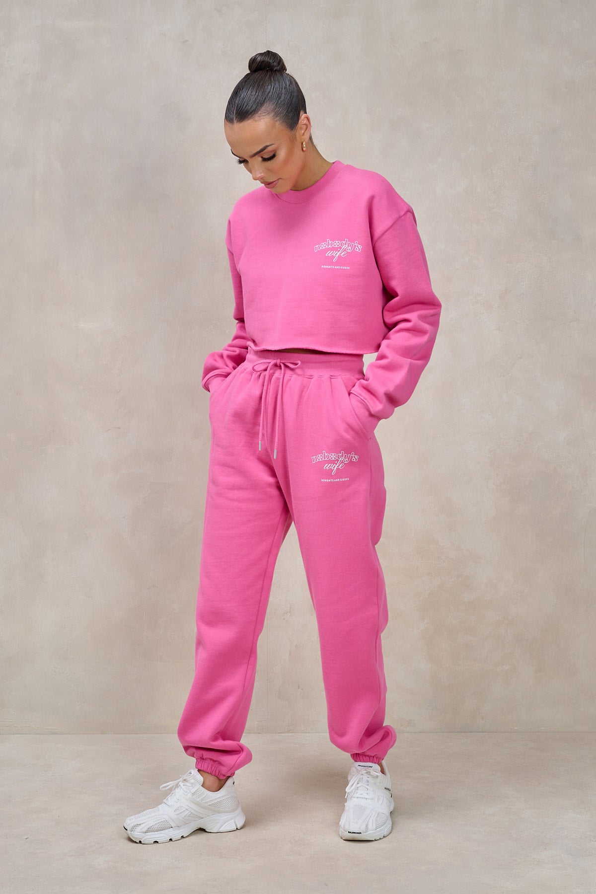 Pink jogging hotsell suits for women